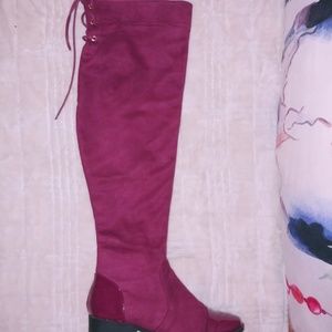Red knee high boot